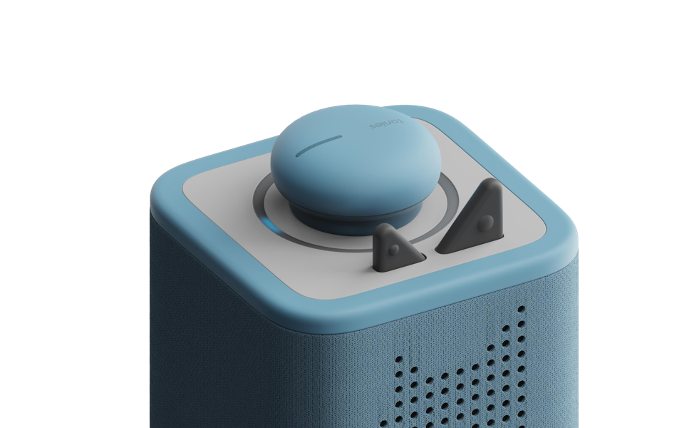 Rounded blue puck concept on top of a blue Toniebox
